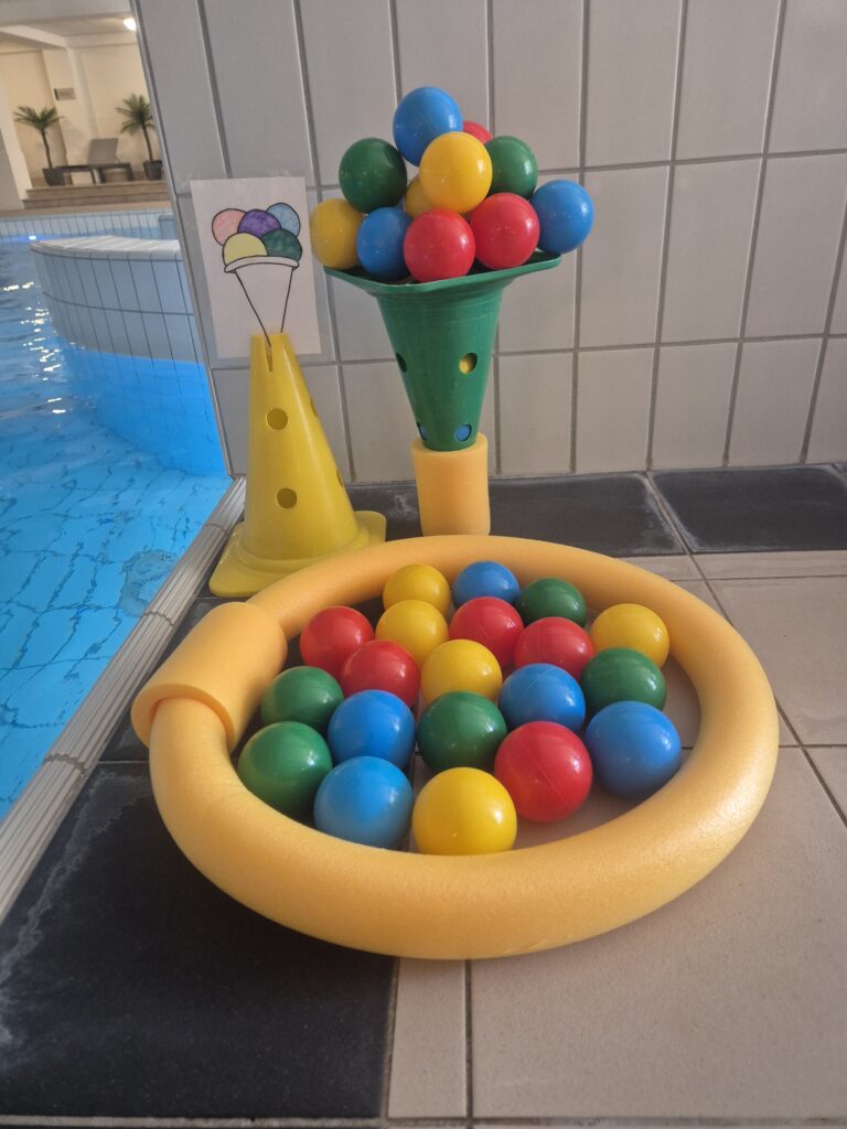 Docent geeft uitleg aan de badrand Docent geeft uitleg aan de badrand
